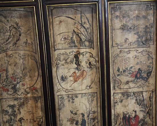 A Chinese 12 panel polychrome and gilt wood screen, 19th century, 274cm x 118cm, hinges removed for hanging